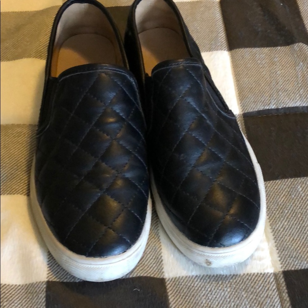 Black quilted slip ons.